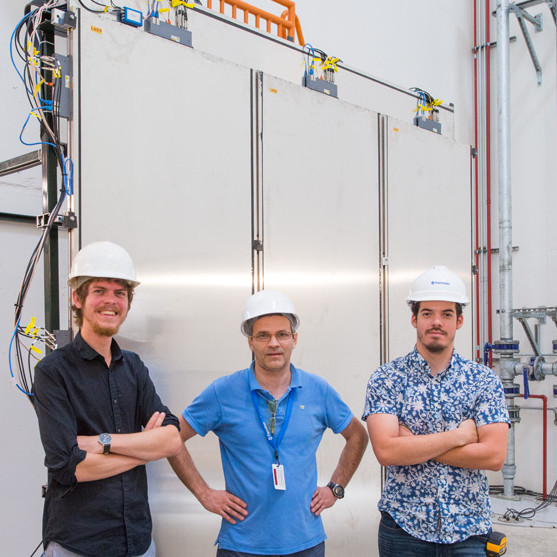 Group collaborators in front of the CRT