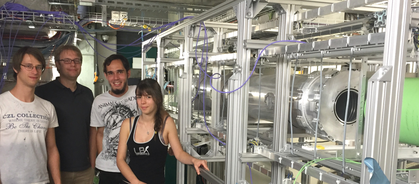 Group collaborators in front of the Beamline